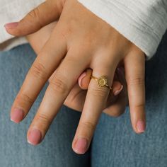 Item Description Known as a symbol of joy and radiance, the sunflower ring is meant to bring a smile to your face by adding the perfect minimal touch to your wardrobe. *If you are in between sizes, we recommend sizing up. Sizing Chart Materials & Warranty Material: Premium Stainless Steel, 18 Karat Gold Plated Lifetime Warranty against all rust and tarnish Packaging:Nominal Velvet Drawstring Pouch Classic Round Birth Flower Jewelry, Adjustable Initial Ring For Everyday, Gold Round Flower Ring For Everyday, Adjustable Gold Flower Ring For Everyday, Sunflower Design Rings As Gifts, Sunflower Design Rings Suitable For Gifts, Dainty Adjustable Engraved Round Ring, Adjustable Dainty Engraved Ring, Stackable Flower Ring For Everyday