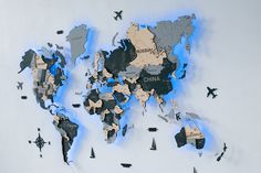 the world map is made up of many different types of paper airplanes flying around it