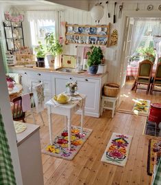 the kitchen is clean and ready to be used as a dining room or breakfast nook