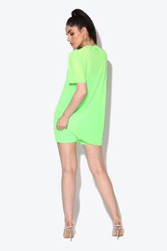 Catch eyes and turn heads this festival season in our Miami Neon Green Oversized Mesh T-shirt. Get summer ready with our oversized tee it’s the perfect poolside cover up during the day or add biker shorts and heels for a neon evening look. Designed in London for KARIZMAFabric: MeshLength: 77cm Gentle dry clean or gentle hand wash cold water and hang to dry. Model is 5 ft 7 and wears a size small.Please use our size guide for body measurements when purchasing, our garments run true to size. Green Summer Streetwear Tops, Oversized Summer T-shirt, Sporty Relaxed Fit T-shirt For Summer, Summer Athleisure T-shirt With Crew Neck, Sporty Crew Neck Summer Tops, Sporty Crew Neck Top For Summer, Summer Crew Neck Top For Loungewear, Summer Loungewear Top With Crew Neck, Green Sporty Summer Tops