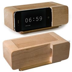 an alarm clock and wooden docking device