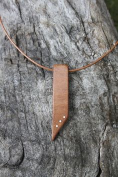 "A rare find, this beautiful and unique Irish Willow pendant has been made for you, or a loved one, in my studio on the West of Ireland. This minimalist pendant features a piece of Willow wood, recycled from musical instruments constructed by a local luthier. As a musician myself, I take enormous satisfaction in creating a necklace whose inherent wood has previously featured in a beautiful hand-made harp. The willow tree has a long history of symbolism rooted in spirituality and cultural traditi Unique Handmade Jewelry For Anniversary Gift, Handmade Square Pendant Jewelry For Everyday, Handmade Pendant Jewelry For Anniversary Gift, Brown Square Pendant Jewelry For Gift, Brown Necklace With Large Pendant As Gift, Brown Necklace With Large Pendant For Gift, Unique Brown Jewelry For Anniversary, Minimalist Brown Necklace For Gift, Minimalist Brown Jewelry As A Gift