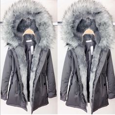 Cozy Coat With A Thick Fur Hood . Detachable Inside Fur Liners . Very Plush . Zips Up And Buttons. Gray Outerwear With Faux Fur Trim For Winter, Gray Faux Fur Outerwear For Winter, Gray Outerwear With Faux Fur Lining For Cold Weather, Silver Hooded Outerwear For Winter, Royal Blue Jeans, Grey Faux Fur Coat, Athleisure Jacket, Tie Dye Jackets, Womens Black Coat