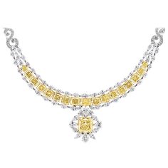 Centers an 8.12 carat brilliant-cut Fancy Yellow Diamond of "VVS1” clarity, and contains another 19.63 carats of radiant-cut Fancy Yellow Diamonds that range from "VVS1-VS2” clarity. Necklace also contains 24.06 carats of white diamonds, their cuts ranging from marquis, pear, oval, and round-brilliant . Set in 18k white and yellow gold. Contains 20 GIA certificates. Expensive Necklaces, Yellow Diamond Necklace, Diamond Circle Necklace, Oval Cut Diamond Engagement Ring, Real Diamond Necklace, Pearl Jewelry Design, Yellow Diamonds, Diamonds Necklace, Fancy Yellow Diamond