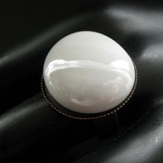 Opaque White Glass Ring in Bronze. White Ring. Bronze Adjustable Ring. Handmade Jewelry. White Cabochon Rings For Formal Occasions, White Cabochon Ring For Formal Occasions, Classic White Oval Dome Ring, White Oval Dome Ring For Gift, White Oval Dome Ring Gift, White Spherical Jewelry Gift, Classic Adjustable White Moonstone Ring, White Minimalist Moonstone Ring For Formal Occasions, Modern White Moonstone Ring As Gift