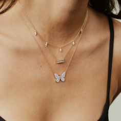 Butterflies always remind us to pause and notice the world around us. Featuring beautiful brilliant diamonds of various sizes, our 14K Gold Diamond Butterfly Necklace catches your eye with its exquisite sparkle. This necklace truly has us all aflutter for butterflies. It can be worn at 16", 17" and 18".Layer our Diamond Ombré Butterfly Necklace with our Diamond Charm Necklace. 0.91 carats diamonds SBN76-YG-WD All sales are final. Diamond Necklace And Earrings, Diamond Butterfly Necklace, Diamond Charm Necklace, Diamond Butterfly, Diamond Stacks, Gold Ear Cuff, Butterfly Pendant Necklace, Ear Cuff Earings, Diamond Charm