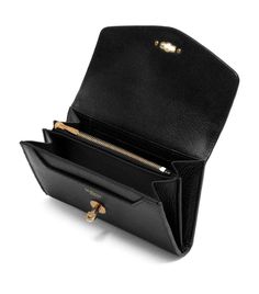 We know to expect tradition from British brand Mulberry, and few collections keep up appearances quite as well as Darley. The pieces within – such as this compact, capacious wallet – celebrate the art of simplicity in their entirety, casting high-quality leather, brass hardware and the ever-iconic Postman’s Lock as the core features. Envelope Wallet With Card Slots For Evening, Elegant Wallets With Removable Pouch As Gift, Elegant Everyday Coin Purse With Card Slots, Elegant Envelope Coin Purse With Interior Card Slots, Elegant Envelope Coin Purse With Card Slots, Formal Envelope Wallet With Card Slots, Elegant Envelope Wallet With Card Slots, Elegant Compact Coin Purse With Coin Pocket, Elegant Compact Trifold Wallet With Coin Pocket