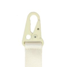 a white strap with two holes on the side and one hole in the middle, attached to