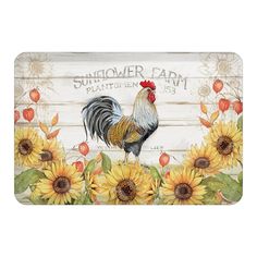 a rooster and sunflowers painted on a wooden sign with the words sunflower farm