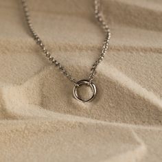 Introducing our Minimalist Circle Necklace, designed with a distinctive Rolo Link Chain that effortlessly exudes a charming and minimalist look. Its versatile hinged circle can be easily detached, offering the freedom to customize your style as you see fit ♡ Layer it with any other necklace or chain of your choice as its simple, yet classic style makes it a staple piece for both casual and formal occasions! Material: High Quality Solid 925 Sterling Silver Finish: Sterling Silver ∙ 18K Gold Featu Initial Tag Necklace, Circle Charm Necklace, Bar Bracelets, Circle Necklace, Circle Pendant, Birthstone Necklace, Pearl Drop Earrings, Staple Pieces, Bar Necklace