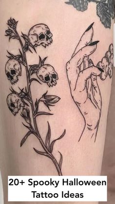 a tattoo with skulls and flowers on it