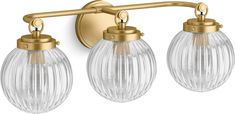 three light bathroom fixture with clear glass globes and gold metal fixtures on an isolated white background