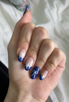 #nails #bluenails #nailart #bows #coquette #coquettenails White Nail Blue French Tip, Grad Party Nails, Summer Nail Inspo 2024 Almond Short, Blue Bow Nails, Blue Coquette Nails, Aesthetic Blue Nails, French Tip Nails Design, Navy Nail Art, Blue Coquette