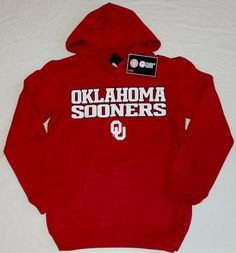 OKLAHOMA SOONERS by GENUINE STUFF HOODED SWEATSHIRT HOODIE NEW WITH TAGS AND HOLOGRAM 80% COTTON 20% POLYESTER YOUTH SIZES: SMALL (8), MEDIUM (10-12) or LARGE (14-16) GRAPHICS SCREENED ON POUCH POCKET RED THERE IS NOTHING ON THE BACK FREE SHIPPING I ACCEPT EBAY MANAGED PAYMENTS. SHIPS NEXT DAY THANKS FOR LOOKING. Cotton Hoodie For Fan Gear, Hooded Cotton Sweatshirt With Team Name, Cotton Hooded Sweatshirt With Team Name, Fall Pre-shrunk Hoodie For Fan Gear, Team-colored Cotton Hoodie For Winter, Team-colored Cotton Hooded Hoodie, Winter Team-colored Cotton Hoodie, Cotton Team Hoodie, Cotton Hoodie With Team Name