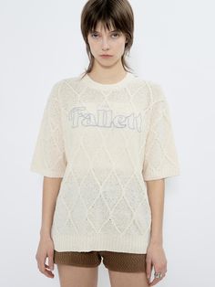 This is a trendy and unique top by FALLETT that is made out of high quality and sturdy material. With distinctive mood of the design and comfortable wear, you can style it for your casual and young daily outfit.- Relaxed loose silhouette- Logo embroidery on the front- Young and unique mood Casual Pointelle Knit T-shirt For Spring, Casual Crew Neck T-shirt With Knit Fabrication, Casual Pointelle Knit T-shirt For Summer, Trendy Short Sleeve Knit Top For Loungewear, Oversized Knit Tops With Letter Print, Beige Letter Print Sweater For Spring, Oversized Cotton Short Sleeve Knit Top, Oversized Cotton Knit Top With Short Sleeves, Trendy Knit Tops For Streetwear