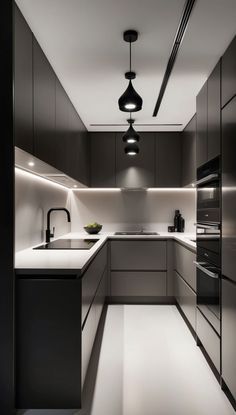 a modern kitchen with black and white accents