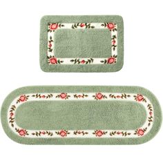 two bathroom rugs with roses on the edges and one has a border in the middle