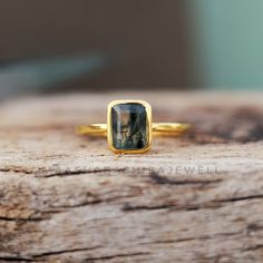 Natural Moss Agate Bezel Ring, Emerald Cut Ring, 18k Gold Plated Ring, Engagement Ring, Solitare Dainty Ring, Anniversary Gift For Women SHOP LINK:- https://www.etsy.com/shop/MaaShabashibaJewell?ref=seller-platform-mcnav 》D E T A I L S《 Gemstone: Natural Moss Agate Gem Color: Green Gem Shape: Emerald Cut Gem Category: Cut Metal: 925 Sterling Silver Purity: 925 Parts Per 1000 Setting Type: Bezel Silver Polish: High Ring Size: All Size Available Please note that there Can be slight variations in s Gold Rectangular Cabochon Rings, Rectangular Gold Cabochon Rings, Rectangular Cabochon Gold Rings, Emerald Cut Ring, Ring Emerald Cut, Green Gem, Zierlicher Ring, Emerald Cut Rings, Silver Polish