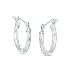 Details set these hoops apart from others. Fashioned in 14K white gold, each 13.0mm hoop earring boasts intricate diamond-cut detailing and a bright buffed finish. A great look any time, these hoops secure with hinged backs. Classic Huggie Hoop Earrings With Diamond Cut, Silver Hypoallergenic Hoop Earrings Fine Jewelry, Silver Small Hoop Earrings In Fine Jewelry Style, Fine Jewelry Silver Small Hoop Earrings, Classic Small Hoop Diamond Cut Earrings, Fine Jewelry Small Hoop Earrings With Diamond Cut, Classic Sterling Silver Hoop Earrings With Diamond Cut, Fine Jewelry Small Hoop Silver Earrings, Classic Sterling Silver Diamond Cut Hoop Earrings