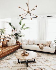 a living room with two couches and a coffee table