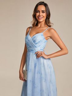 Floral Printed Empire Waist Spaghetti Strap Formal Evening Dress with V-Neck #color_Ice Blue Summer Tulle Maxi Dress With V-neck, V-neck Prom Dress With Delicate Straps, Prom Dress With Delicate Straps And V-neck, Delicate Straps V-neck Prom Dress, Elegant Tulle Dress With Delicate Straps, Summer Prom Dresses With Surplice Neckline, Elegant Dress With Delicate Tulle Straps, Elegant V-neck Maxi Dress With Delicate Straps, Summer V-neck Chiffon Dress With Pleated Bodice