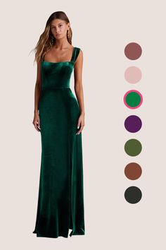 a woman in a long green dress with different colors