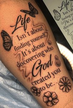 a person with a tattoo on their arm that says life isn't about finding yourself it's about discovering who created you