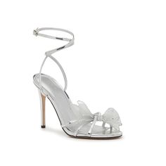 Nine West-Massa Sandal Add a fun flair to your formalwear by complementing your look with the Massa sandals from Nine West. The twisted ankle strap design, bow details, and crystal accents on the end take this style to the next level. Silver Bow Heels, Twisted Ankle, Bow Heels, Shoe Inspo, Silver Bow, Silver Heels, Silver Shoes, Strap Design, Senior Year