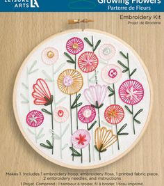 an embroidery kit with flowers on it