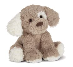 a brown stuffed dog with white fur on it's face and ears sitting down