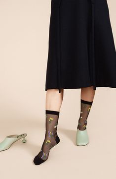 Delicate flowers embellish these sheer crew socks that add a sweet detail to any ensemble. Nylon Hand wash, line dry Made in Japan Black Spring Party Socks, Black Party Socks For Spring, Elegant Black Socks For Spring, Elegant Mid-calf Socks For Spring, Trendy Party Socks For Spring, Sheer Socks, Soft Shoes, Delicate Flowers, Sustainable Brand