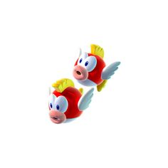 two red and yellow toy fish on white background with clipping area for text or image