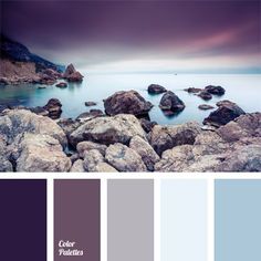 some rocks and water in the middle of a color scheme with purple, blue, and grey