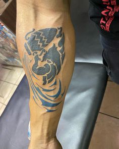 a person with a tattoo on their leg