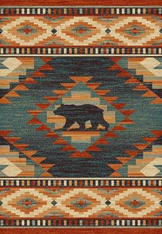 an area rug with a bear in the center and native style design on the bottom