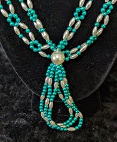 "Vintage Teal Green and White Beaded Necklace 18-inch double strand. Gorgeous Pattern Shop policies for this order:    Shipping    Customs and import taxes  Buyers are responsible for any customs and import taxes that may apply. Sellers aren't responsible for delays due to customs.      Returns & exchanges    I gladly accept returns and exchanges just contact me within 14 days of delivery Ship returns back to me within: 30 days of delivery. Please contact us if you are not satisfied with the item after you receive it. Just contact us using the \"Messages.\"  All replies will be sent to your messages, if you don't get response within 1-2 business days, please check your messages. We will always do our best to help to try to resolve a problem or concern. Our goal is to provide great customer Cheap Green Double Strand Beaded Necklace, White Beaded Necklace, Hallmark Keepsake Ornaments, Vintage Pins, White Beads, Teal Green, Green And White, Shop Policies, Hippie Boho