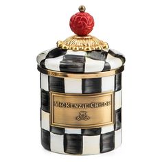 a black and white checkered jar with a gold lid