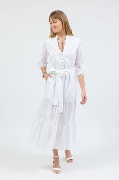 The St. Barts Belted Maxi Dress is a show stopper! This stunning dress features puff sleeves with elastic cuffs, a shank button detail, and a removable matching belt. Product Details: Made with 100% Sustainable Cotton Front loop shank button closures Removable belt Side pockets Made in the USA White maxi dress with pockets || Belted Maxi Dress, White Linen Dresses, St Barts, Shank Button, White Eyelet, Luxury Dress, White Maxi Dresses, Luxury Women, Stunning Dresses