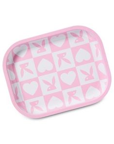 a pink and white tray with hearts on it