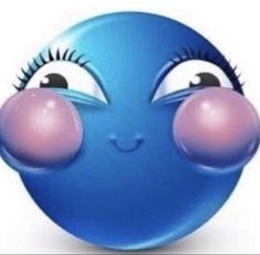 the face of a blue ball with eyes and lashes on it's nose is shown