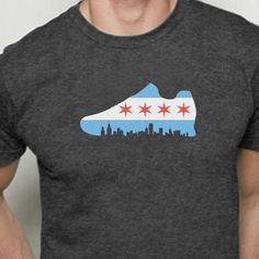 a man wearing a t - shirt with the chicago flag on it