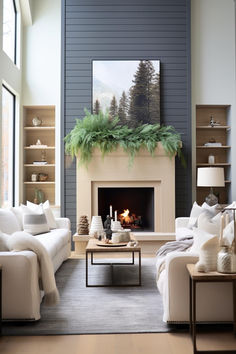 a living room filled with furniture and a fire place under a painting on the wall