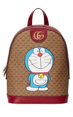 Doraemon small backpackSingle flat top handleTwo-way zip fasteningGold-tone logo plaqueGraphic printCherry red leather trim.Multiple internal slip pocketsLeather handleComposition: Canvas 100%, Leather 100%Lining: Cotton 100%Made in Italy Monogram Backpack, Backpack Material, Herschel Heritage Backpack, Small Backpack, Designer Backpacks, Cherry Red, Fast Fashion, Leather Handle, Birmingham