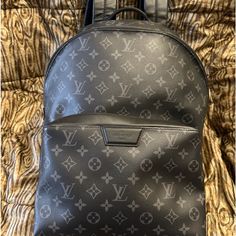 Pretty Much Brand New Used Once. Black Monogram Canvas Travel Bag, Luxury Coated Canvas Backpack For Everyday, High-end Black Backpack, Luxury Bags With Designer Logo, Designer Everyday Bags With Monogram Print, Designer Bags With Monogram Print For Everyday Use, Black Monogram Canvas Bag With Monogram Print, Luxury Everyday Backpack With Dust Bag, High-end Black Monogram Canvas Bag