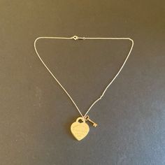 “New” Tiffany Necklace With Gold Key This Is A Vey Nice Piece. Won’t Last Long Make A Deal Today! Tiffany Gold Necklace, Jewelry Tiffany And Co, Tiffany Key Necklace, Cartouche Necklace, Tiffany Gold, Peach Necklace, Jewelry Tiffany, Tiffany And Co Necklace, Tiffany Necklace