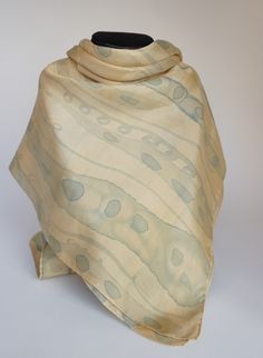 This large scarf is made of coffee-colored silk with a few touches of pastel blue. The scarf soaked for a while in a coffee bath, it colored naturally, giving these hazel tones I decorated this square with small pastel blue decorations * 100% silk * hand rolled * 90 x 90 cm * Plain pattern * High quality French paintings. Painting with coffee *Heat fixed to preserve colors * Made in Lyon * light brown, coffee, blue Unique gift to give to please Mother's Day, Wedding Anniversary, Birthdays, Grand Painting With Coffee, Coffee Bath, Blue Decorations, Autumn Scarf, French Paintings, Silk Scarf Painting, Hand Painted Silk Scarf, Scarf Silk, Fall Scarves