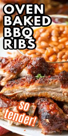 bbq ribs and baked beans on a plate with the words oven baked ribs so tender