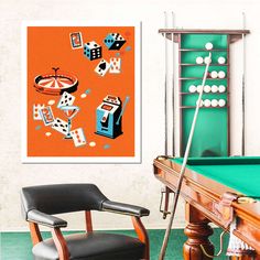 a room with a pool table, chair and poster hanging on the wall above it