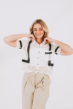 Take your style to the next level with the Higher Levels Top. This unique top features a stunning crochet design, 1 convenient pocket, and a bold color block point for added flair. Upgrade your wardrobe and stand out from the crowd with this must-have top. Details Crochet 1 pocket Color block point Sizing Approximate measurements: SIZE LENGTH BUST One Size 21" 42" Fabric has no stretchModel is 5’9 Material 100% CottonHand wash coldHang dry Trendy White Tops With Crochet Trim, Trendy White Top With Crochet Trim, Trendy White Cotton Crochet Top, White Cotton Crochet Top In Trendy Style, Casual White Tops With Crochet Trim, White Tops With Pockets For Vacation, Casual White Knit Top With Crochet Trim, White Open Knit Casual Tops, Casual White Open Knit Tops