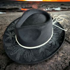 Black burned small brim Cowboy Hat - burned using Pyrography techniques. Adjustable for a tighter fit. Each Hat is freehand burned making this Hat a one of a kind. Hat is sprayed for weather protection. Each Hat comes with a Handcrafted macrame Hat Wall Hanger and PIPER Signature DUST/Travel Bag. Western Handwoven Brimmed Hat, Western Distressed Flat Brim Hat, Artisan Flat Brim Fedora For Western-themed Events, Western Hat Bands With Upf 50+ And Flat Brim, Western Black Brimmed Felt Hat, Velvet Hat, Cowboy Style, Handbag Accessories, Bridal Accessories